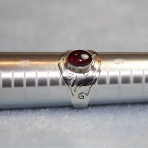 Silver and garnet ring